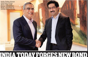 A Mail Today news article with Aroon Purie with Kumar Mangalam Birla in the photograph