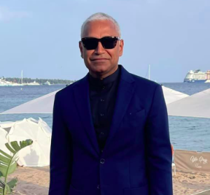 Sivakumar Sundaram wearing dark glasses